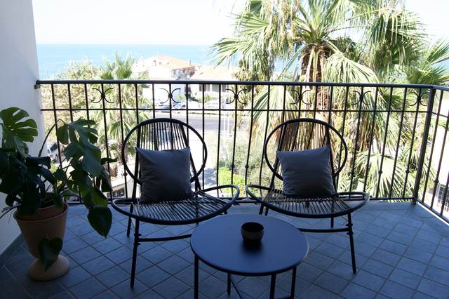 Balcony with sea view at Blue Horizon Apartment